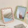 3a51912d-b42d-42b1-9572-25229e7d0560.jpg 1pc Wave-Shaped Makeup Mirror, Desktop Stand or Wall-Mounted Vanity Mirror