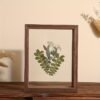 85fea60f-64d1-46c4-846e-20e48d6568a1.jpg Wooden Floating Photo Frame – Double Acrylic Display