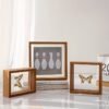 cdf52f56-812d-47ce-9d9d-829f1ef21092.jpg Wooden Floating Photo Frame – Double Acrylic Display